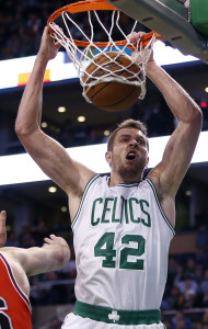 Dec 9, 2015; Boston, MA, USA; Boston Celtics forward David Lee (42) makes the basket against Chicago Bulls center Pau Gasol (16) in the second half at TD Garden. Celtics defeated the Bulls 105-100. Mandatory Credit: David Butler II-USA TODAY Sports