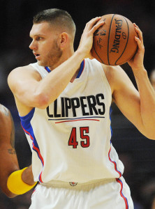 March 13, 2016; Los Angeles, CA, USA; Los Angeles Clippers center Cole Aldrich (45) moves the ball against Cleveland Cavaliers forward Channing Frye (9) during the first half at Staples Center. Mandatory Credit: Gary A. Vasquez-USA TODAY Sports